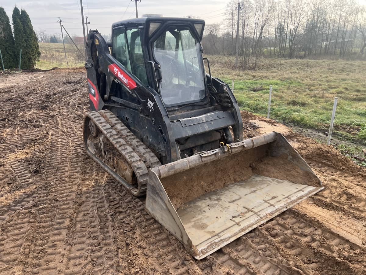 Bobcat Vilniuje su planiravimo kaušu lygina sklypą